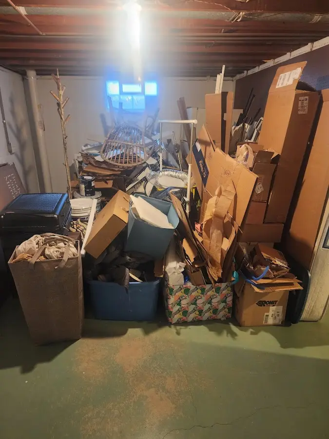 Roll-off dumpster container at job site for Concrete Dumpster Rental in Newport